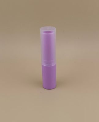 Embalagem de protetor labial roxo pequeno com tampa canelada transparente para batons