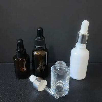 Fornecedor de alta qualidade Amber Clear Boston 2oz Botão de óleo essencial de vidro com gotinha 60ml para soro