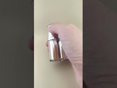 Botão de bomba sem ar de duas cores dourado e prateado com revestimento exterior para produtos cosméticos e de cuidados com a pele