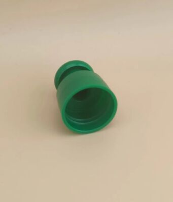 Tampa lisa de plástico verde com botão para frascos cosméticos