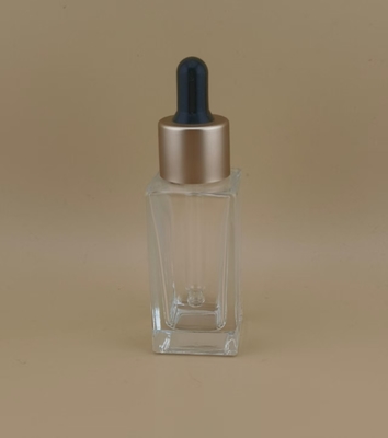 Garrafa de gotejante de essência facial com tampa de parafuso de ouro pequena e clara