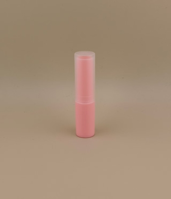 Embalagem rosa pequena para protetor labial com tampa canelada transparente para batons