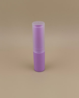 Embalagem de protetor labial roxo pequeno com tampa canelada transparente para batons