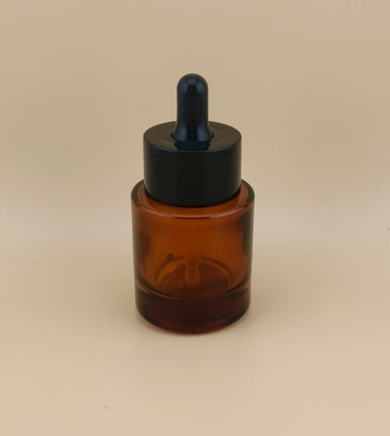 Frasco conta-gotas de vidro pequeno castanho com design delicado para essência facial