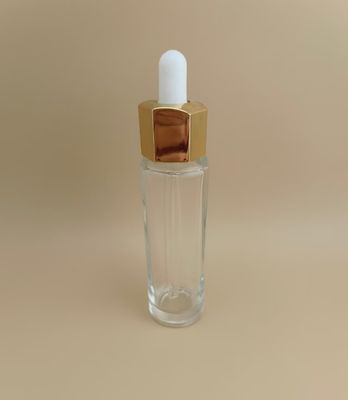 Frasco conta-gotas transparente personalizado com CRC possível e design poligonal agradável, oferecendo uma solução de embalagem durável para essência